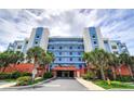 Condo building exterior showcasing modern design and oceanfront location at 5300 S Atlantic Ave # 17-206, New Smyrna Beach, FL 32169