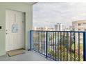 Private balcony with ocean view and blue railings at 5300 S Atlantic Ave # 9-507, New Smyrna Beach, FL 32169