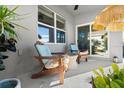 Relaxing outdoor patio featuring comfortable seating and a shaded area at 5340 Bear Corn Run, Port Orange, FL 32128