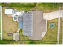 Top-down view showcasing the house, patio, and backyard at 705 Wayne Ave, New Smyrna Beach, FL 32168