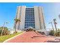 High-rise building with red brick paved entrance at 2545 S Atlantic Ave # Ph4, Daytona Beach, FL 32118