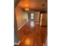 Bright dining room with hardwood floors and a chandelier at 2723 Juniper Dr, Edgewater, FL 32141