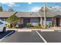 Front view of condo with parking and landscaping at 2916 Duchess Oak Ct, St Cloud, FL 34769