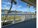 White railing balcony overlooking the water at 335 N Causeway # H23, New Smyrna Beach, FL 32169