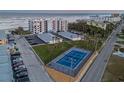 Oceanfront property featuring a tennis court at 401 N Atlantic Ave # 504, New Smyrna Beach, FL 32169