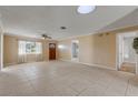 Spacious living area featuring tile flooring and ample natural light at 1732 Travelers Palm Dr, Edgewater, FL 32132