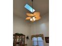 High ceiling dining room with a lovely chandelier at 2259 Candlewood E Ln, New Smyrna Beach, FL 32168