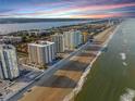 Aerial view of beachfront high-rise buildings and ocean at 2967 S Atlantic Ave # 801, Daytona Beach Shores, FL 32118