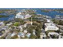 Aerial view of the neighborhood showing property location near the water and local businesses at 314 Hillman St, New Smyrna Beach, FL 32168