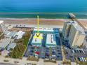 Aerial view showing condo location near beach and pier at 3641 S Atlantic Ave # 221, Daytona Beach, FL 32118