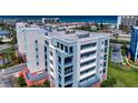 An aerial shot showcasing the top of a multi-story beachfront building with scenic ocean views at 5300 S Atlantic Ave # 3-504, New Smyrna Beach, FL 32169
