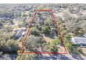 Aerial view showing the property's expansive lot size at 735 S Glencoe Rd, New Smyrna Beach, FL 32168