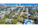 Panoramic aerial view of a residential neighborhood near the ocean with lush greenery and blue ocean waters at 808 E 19Th Ave, New Smyrna Beach, FL 32169