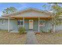 House with a covered porch and walkway at 904 Wilkins St, New Smyrna Beach, FL 32168