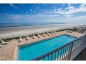 Picturesque views from the oceanfront pool and deck at 1705 S Atlantic Ave # 201, New Smyrna Beach, FL 32169