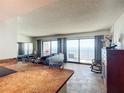 Cozy living room with floor to ceiling windows and ocean views at 4445 S Atlantic Ave # 804, Ponce Inlet, FL 32127