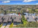 Townhome overlooking a lake and lush greenery at 448 Shorewood Ln, New Smyrna Beach, FL 32168