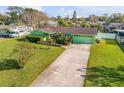 Charming green single-story home with well-manicured lawn and inviting curb appeal at 921 Duncan Rd, South Daytona, FL 32119