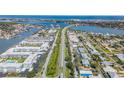 Aerial view of a coastal neighborhood with bridge access, showcasing the area's convenient location at 325 N Causeway # B101, New Smyrna Beach, FL 32169