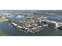 Panoramic aerial view of the coastal community, highlighting the waterfront location at 43 Jacaranda Cay Ct # 430, New Smyrna Beach, FL 32169