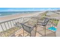 Balcony with comfortable seating and a gorgeous ocean view at 4767 S Atlantic Ave # 404, Ponce Inlet, FL 32127