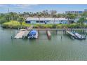 A waterfront residence with private dock and boat slip, providing convenient access to waterways at 49 Jacaranda Cay Ct # 49, New Smyrna Beach, FL 32169