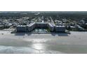 Aerial view of beachside condos with a pool and beachfront access at 2401 S Atlantic Ave # A604, New Smyrna Beach, FL 32169