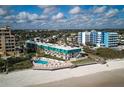 Charming beachfront condo featuring a community pool, beach access, and lush surroundings at 701 S Atlantic Ave # 11, New Smyrna Beach, FL 32169