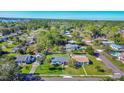 Aerial shot of home and neighborhood showcasing the home's location and property lines at 902 Conrad Dr, New Smyrna Beach, FL 32168