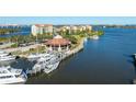 Beautiful aerial view of the marina, dockside restaurant and condos on the water at 533 Marina Point Dr # 533, Daytona Beach, FL 32114