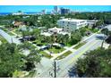 Lovely home surrounded by mature trees, with a red tile roof and easy access to nearby city amenities at 746 N Halifax Ave, Daytona Beach, FL 32118