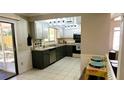 Functional kitchen with updated countertops and stainless steel appliances at 171 Fox Glen Ct, Ormond Beach, FL 32174