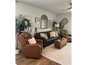 Comfortable living room with neutral tones, stylish furniture and cozy decor at 181 Caryota Ct, New Smyrna Beach, FL 32168