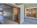 Inviting condo entrance with neutral siding, unit number, and access to the complex at 4307 Sea Mist Dr # 135, New Smyrna Beach, FL 32169
