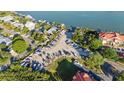An aerial shot showcases boat storage and waterfront access near the condo community at 445 Bouchelle Dr # 301, New Smyrna Beach, FL 32169