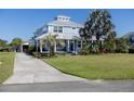 Charming two-story home with well-maintained lawn and inviting front yard at 1787 Earhart Ct, Port Orange, FL 32128