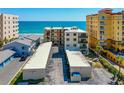 Rear exterior view of condo building offering beach access at 3807 S Atlantic Ave # 302, Daytona Beach Shores, FL 32118