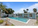 Inviting backyard pool area with a spacious patio, perfect for relaxing and entertaining at 13 Essex Dr, Ormond Beach, FL 32176