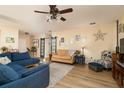 Inviting living room with cozy seating, modern lighting, and stylish decor at 1748 Savannah Ln, Port Orange, FL 32128