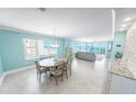 Open floor plan featuring dining area, living room with ocean views, and modern finishes at 3311 S Atlantic Ave # 801, Daytona Beach, FL 32118