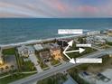 Aerial view of a coastal community, highlighting proximity to the beach and local amenities at 6771 Turtlemound Rd, New Smyrna Beach, FL 32169