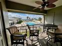 Enjoy pool views from this lanai with comfortable seating, perfect for relaxing and entertaining at 2100 N Peninsula Ave # 2160, New Smyrna Beach, FL 32169