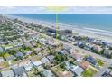 Aerial view of a neighborhood home close to the ocean and beautiful Florida beaches at 2510 S Atlantic Ave, New Smyrna Beach, FL 32169
