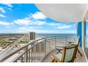Inviting balcony with comfortable seating and panoramic ocean views at 2625 S Atlantic Ave # 18Nw, Daytona Beach, FL 32118