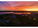 Sunset image of the area around 265 Minorca Beach Way condominium with bright orange and yellow sky at 265 Minorca Beach Way # 902, New Smyrna Beach, FL 32169