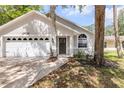 Lovely single-Gathering home features a modern front door and attached two-car garage at 2822 Brookline Ave, New Smyrna Beach, FL 32168