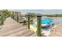 Community marina featuring a boat dock with boat and kayak parking and calm water views at 76 Heather Point Ct, New Smyrna Beach, FL 32169