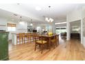Bright, open floorplan seamlessly integrates kitchen, dining, and living spaces at 1327 Wayne Ave, New Smyrna Beach, FL 32168