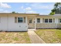 Charming single story home with stone accents, neutral paint, and low maintenance yard at 167 N Hill Ave # 60, Deland, FL 32724