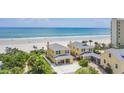 Stunning aerial view of two beachfront homes with direct access to the ocean at 2101 Hill St, New Smyrna Beach, FL 32169
